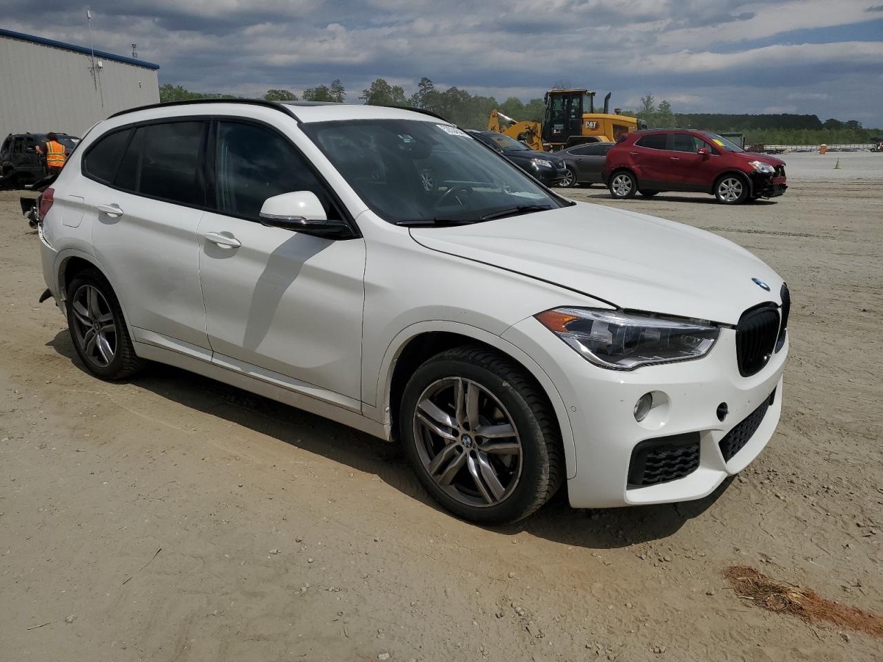 Photo 3 VIN: WBXHT3C35J5L34730 - BMW X1 