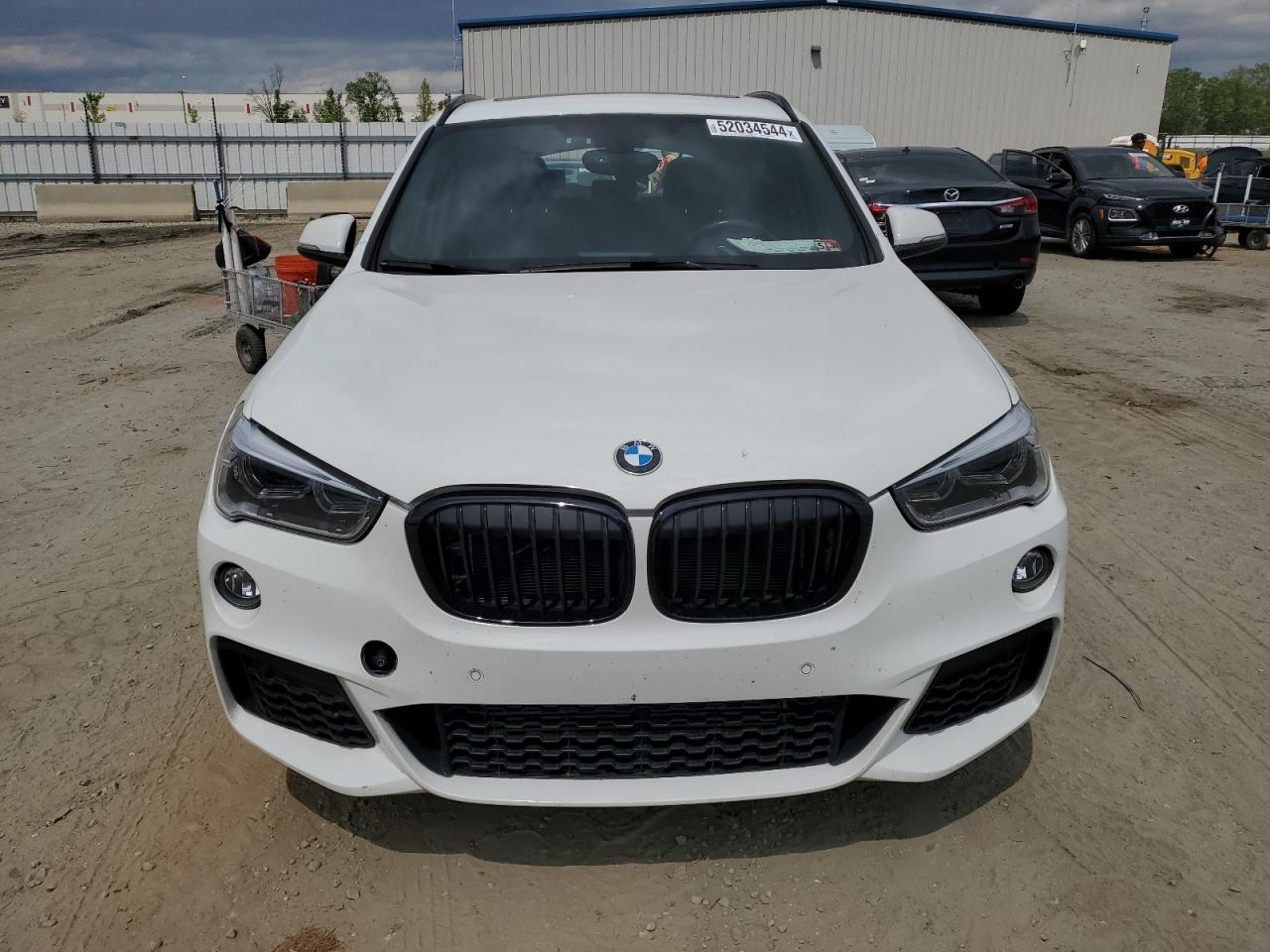 Photo 4 VIN: WBXHT3C35J5L34730 - BMW X1 