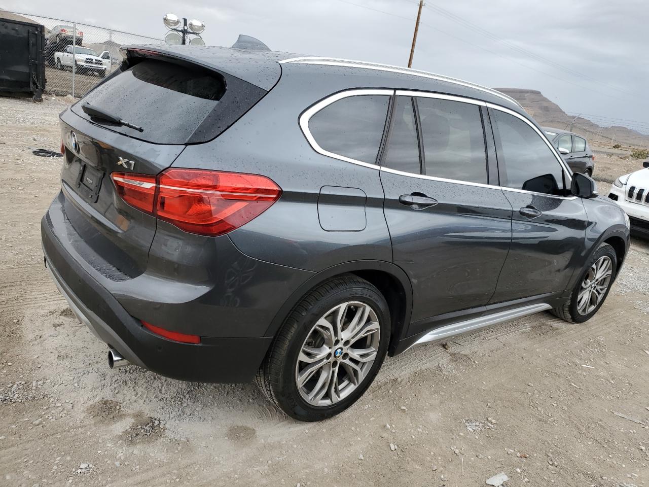 Photo 2 VIN: WBXHT3C36G5E50093 - BMW X1 