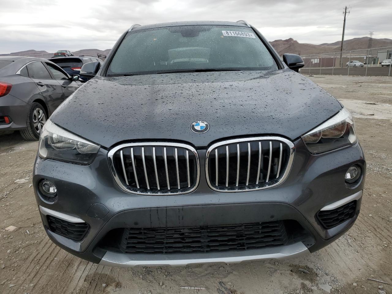 Photo 4 VIN: WBXHT3C36G5E50093 - BMW X1 