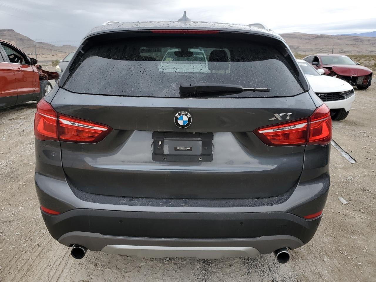 Photo 5 VIN: WBXHT3C36G5E50093 - BMW X1 