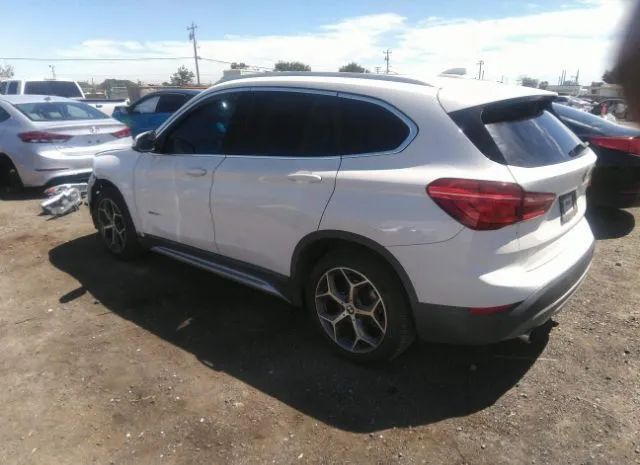 Photo 2 VIN: WBXHT3C36G5E52796 - BMW X1 