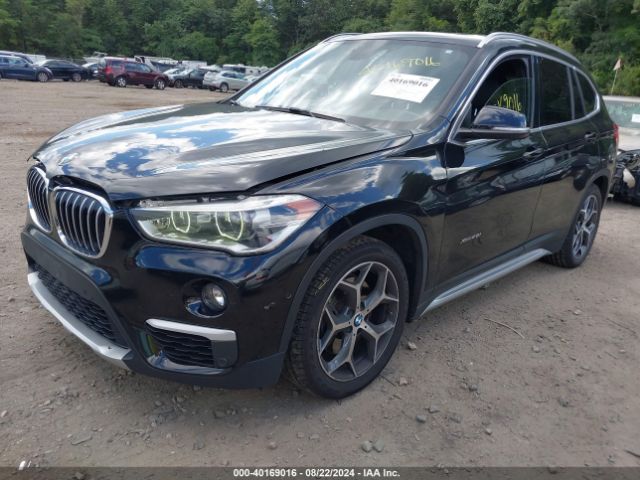 Photo 1 VIN: WBXHT3C36G5E54919 - BMW X1 