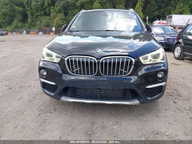 Photo 5 VIN: WBXHT3C36G5E54919 - BMW X1 