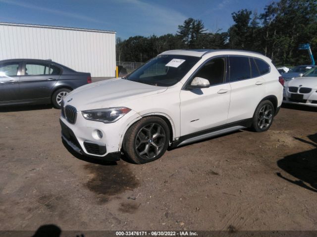 Photo 1 VIN: WBXHT3C36G5E55262 - BMW X1 