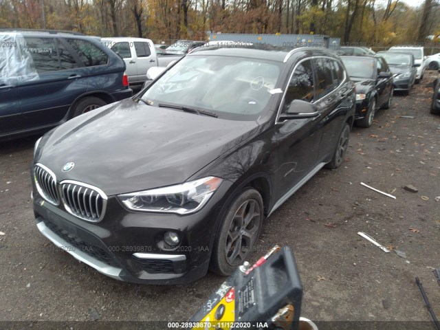 Photo 1 VIN: WBXHT3C36G5F64367 - BMW X1 