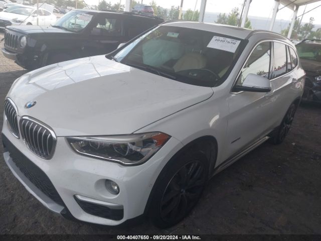 Photo 1 VIN: WBXHT3C36G5F64773 - BMW X1 