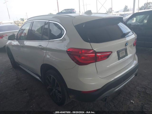 Photo 2 VIN: WBXHT3C36G5F64773 - BMW X1 