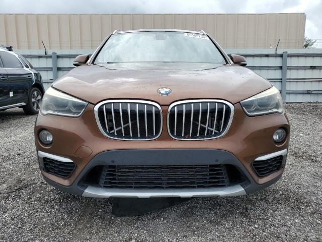 Photo 4 VIN: WBXHT3C36GP881499 - BMW X1 