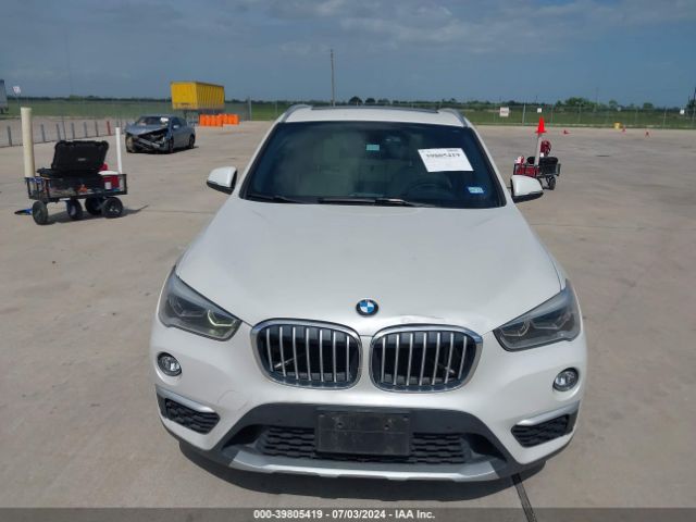 Photo 5 VIN: WBXHT3C36GP884340 - BMW X1 