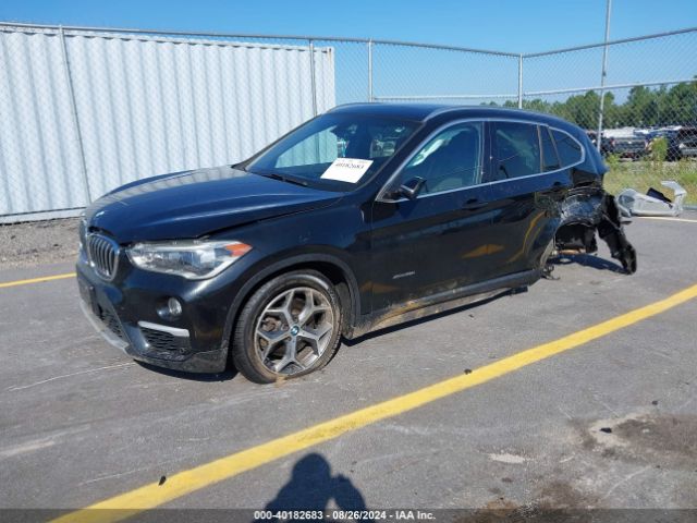 Photo 1 VIN: WBXHT3C36H5F68971 - BMW X1 