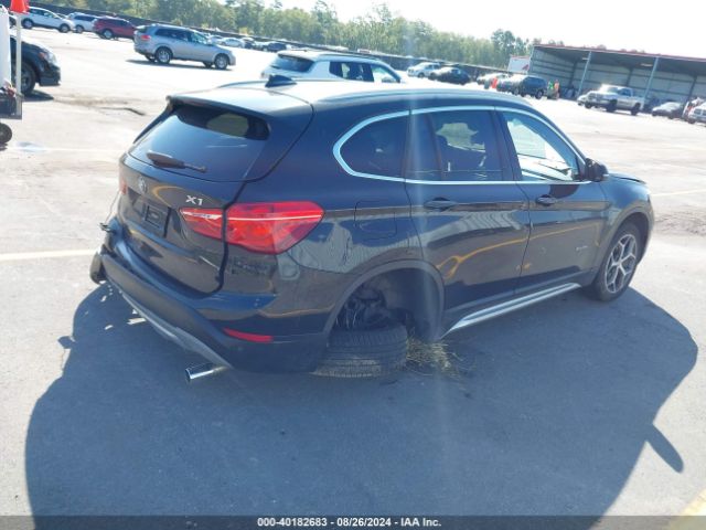 Photo 3 VIN: WBXHT3C36H5F68971 - BMW X1 