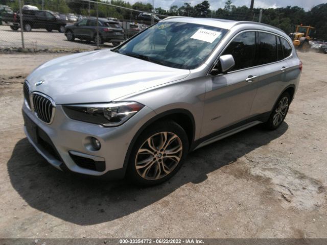 Photo 1 VIN: WBXHT3C36H5F70252 - BMW X1 