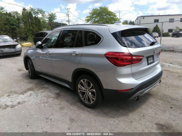 Photo 2 VIN: WBXHT3C36H5F70252 - BMW X1 