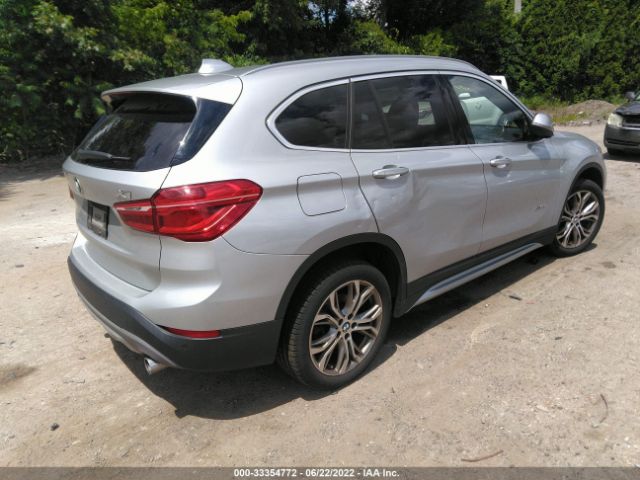 Photo 3 VIN: WBXHT3C36H5F70252 - BMW X1 