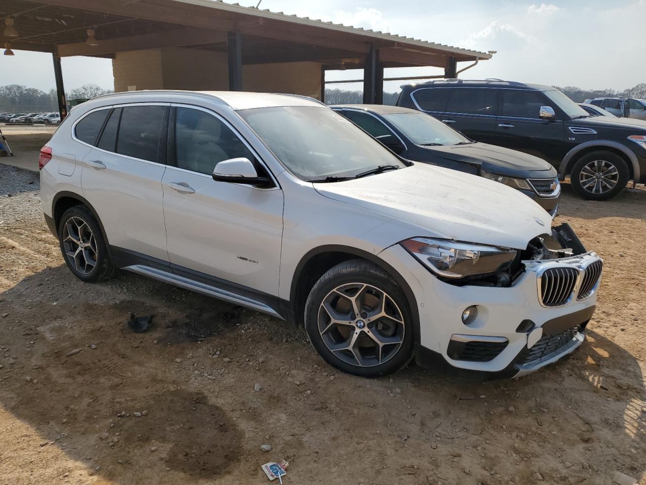 Photo 3 VIN: WBXHT3C36H5F74026 - BMW X1 