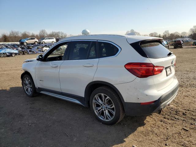 Photo 1 VIN: WBXHT3C36H5F76407 - BMW X1 