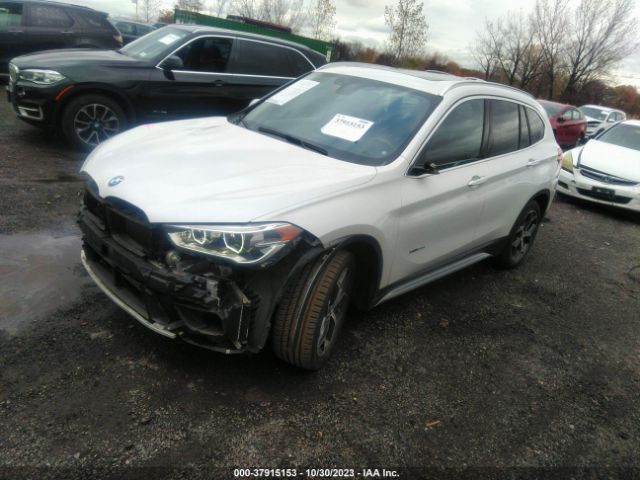 Photo 1 VIN: WBXHT3C36H5F77007 - BMW X1 