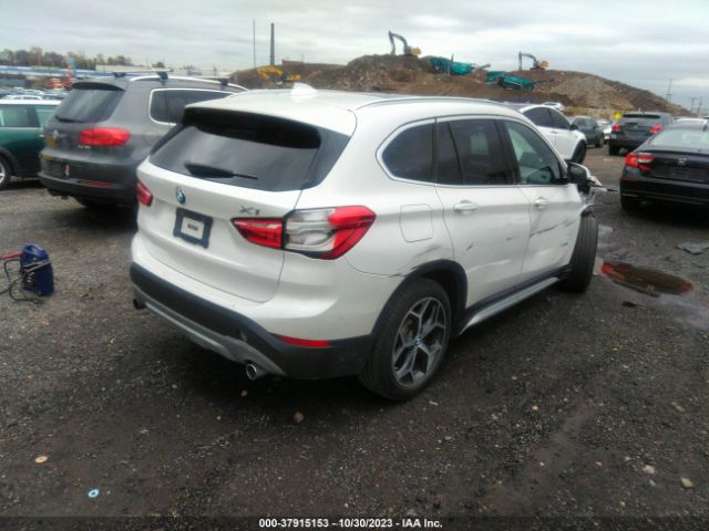 Photo 3 VIN: WBXHT3C36H5F77007 - BMW X1 