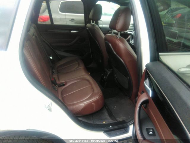 Photo 7 VIN: WBXHT3C36H5F77007 - BMW X1 