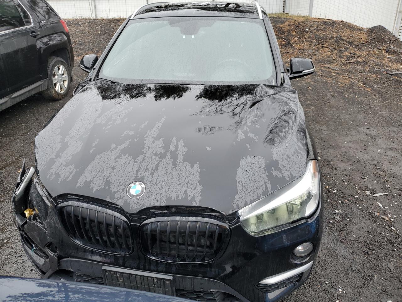 Photo 4 VIN: WBXHT3C36H5F77198 - BMW X1 