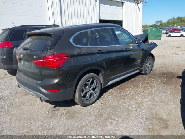 Photo 3 VIN: WBXHT3C36H5F81705 - BMW X1 