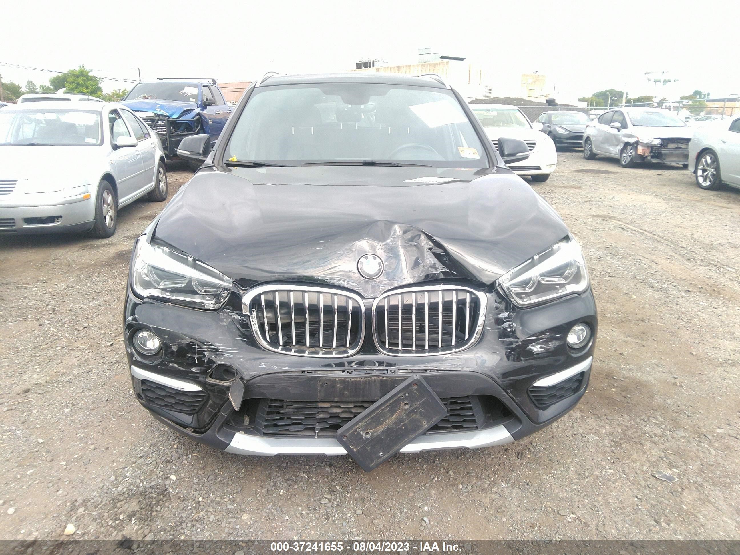 Photo 11 VIN: WBXHT3C36H5F83146 - BMW X1 