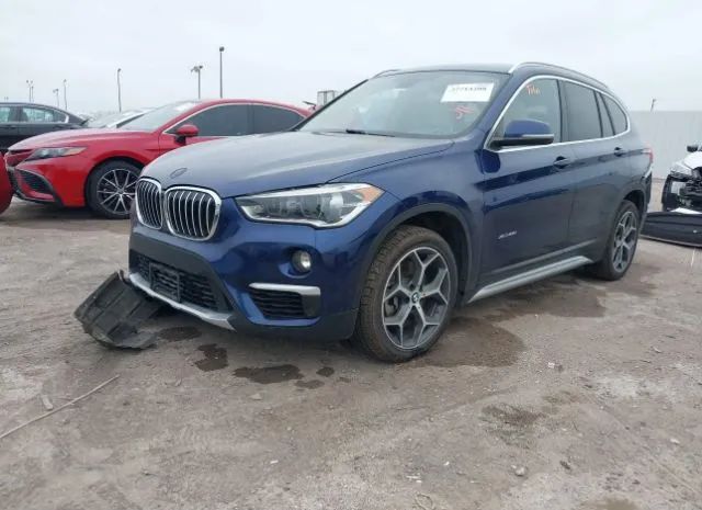 Photo 1 VIN: WBXHT3C36H5F84328 - BMW X1 