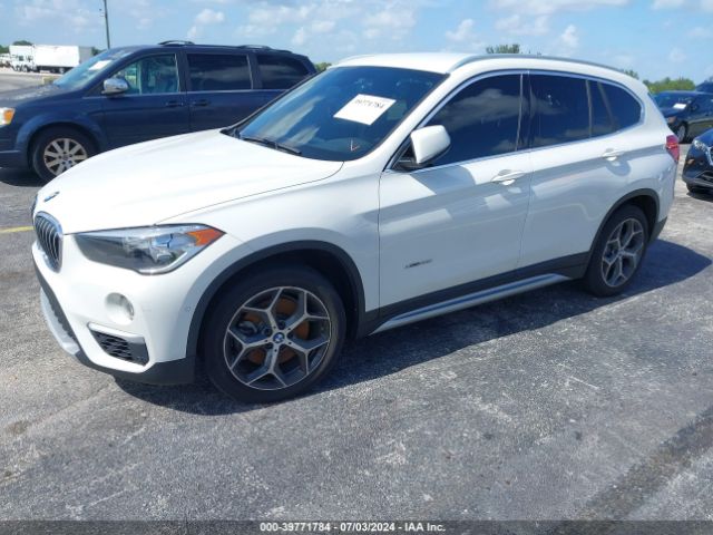 Photo 1 VIN: WBXHT3C36H5F86824 - BMW X1 