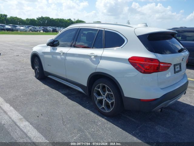 Photo 2 VIN: WBXHT3C36H5F86824 - BMW X1 