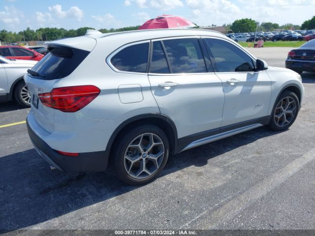 Photo 3 VIN: WBXHT3C36H5F86824 - BMW X1 