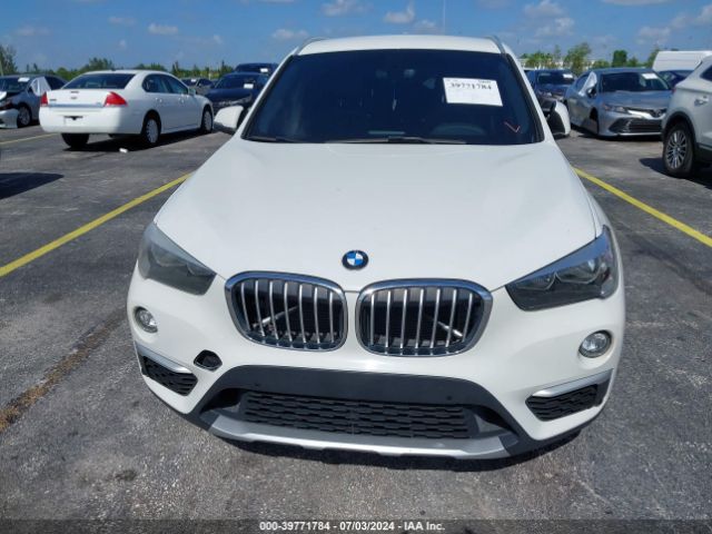 Photo 5 VIN: WBXHT3C36H5F86824 - BMW X1 