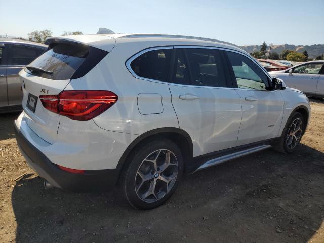 Photo 2 VIN: WBXHT3C36H5F87729 - BMW X1 XDRIVE2 