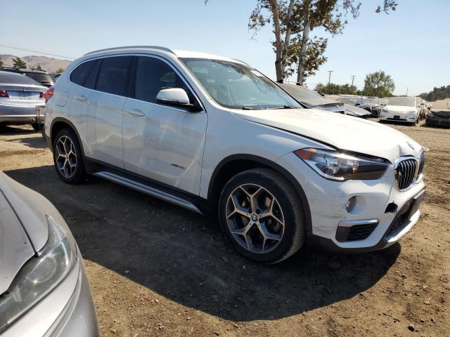 Photo 3 VIN: WBXHT3C36H5F87729 - BMW X1 XDRIVE2 