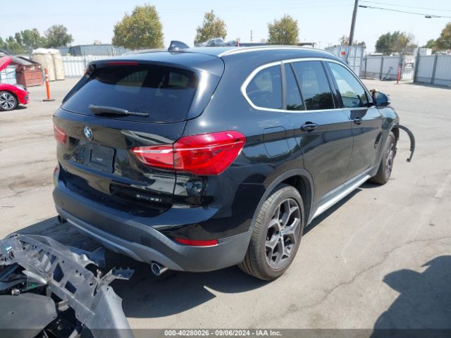 Photo 3 VIN: WBXHT3C36J3H33063 - BMW X1 