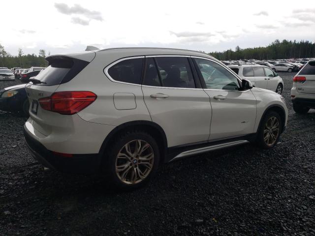 Photo 2 VIN: WBXHT3C36J5F88921 - BMW X1 