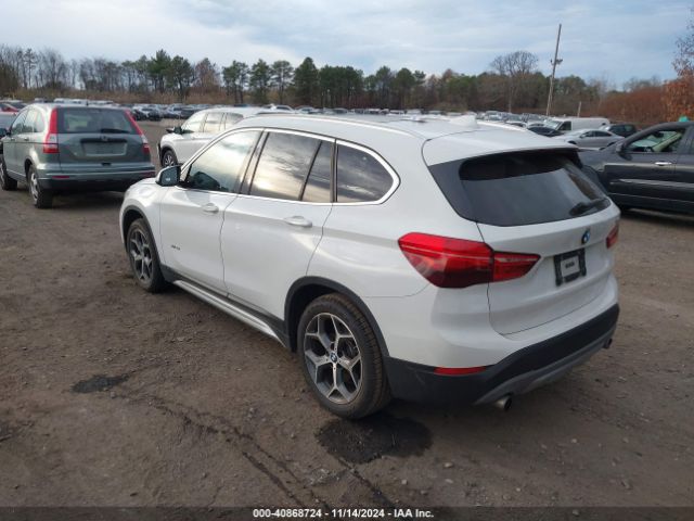 Photo 2 VIN: WBXHT3C36J5F91124 - BMW X1 