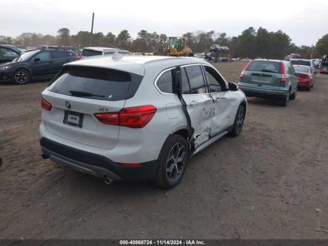 Photo 3 VIN: WBXHT3C36J5F91124 - BMW X1 