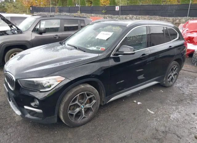 Photo 1 VIN: WBXHT3C36J5K20977 - BMW X1 