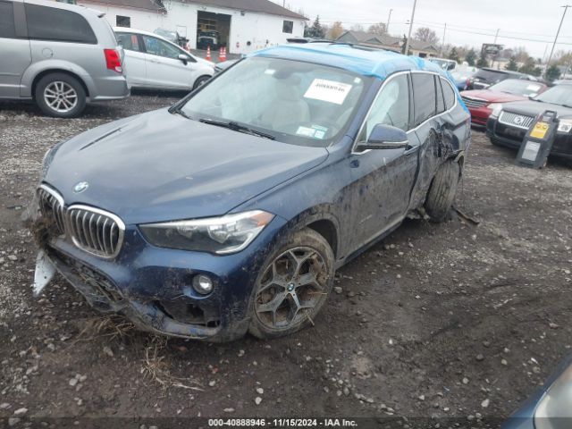 Photo 1 VIN: WBXHT3C36J5K31218 - BMW X1 