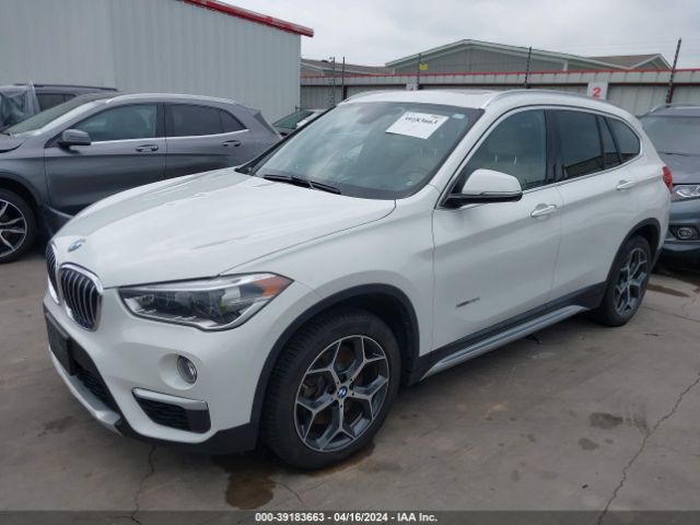 Photo 1 VIN: WBXHT3C36J5L25146 - BMW X1 