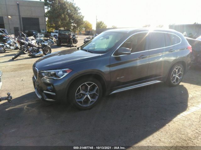 Photo 1 VIN: WBXHT3C37G5E56050 - BMW X1 