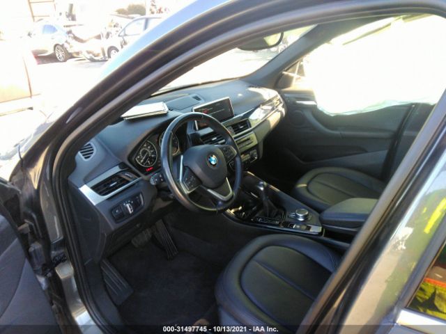 Photo 4 VIN: WBXHT3C37G5E56050 - BMW X1 