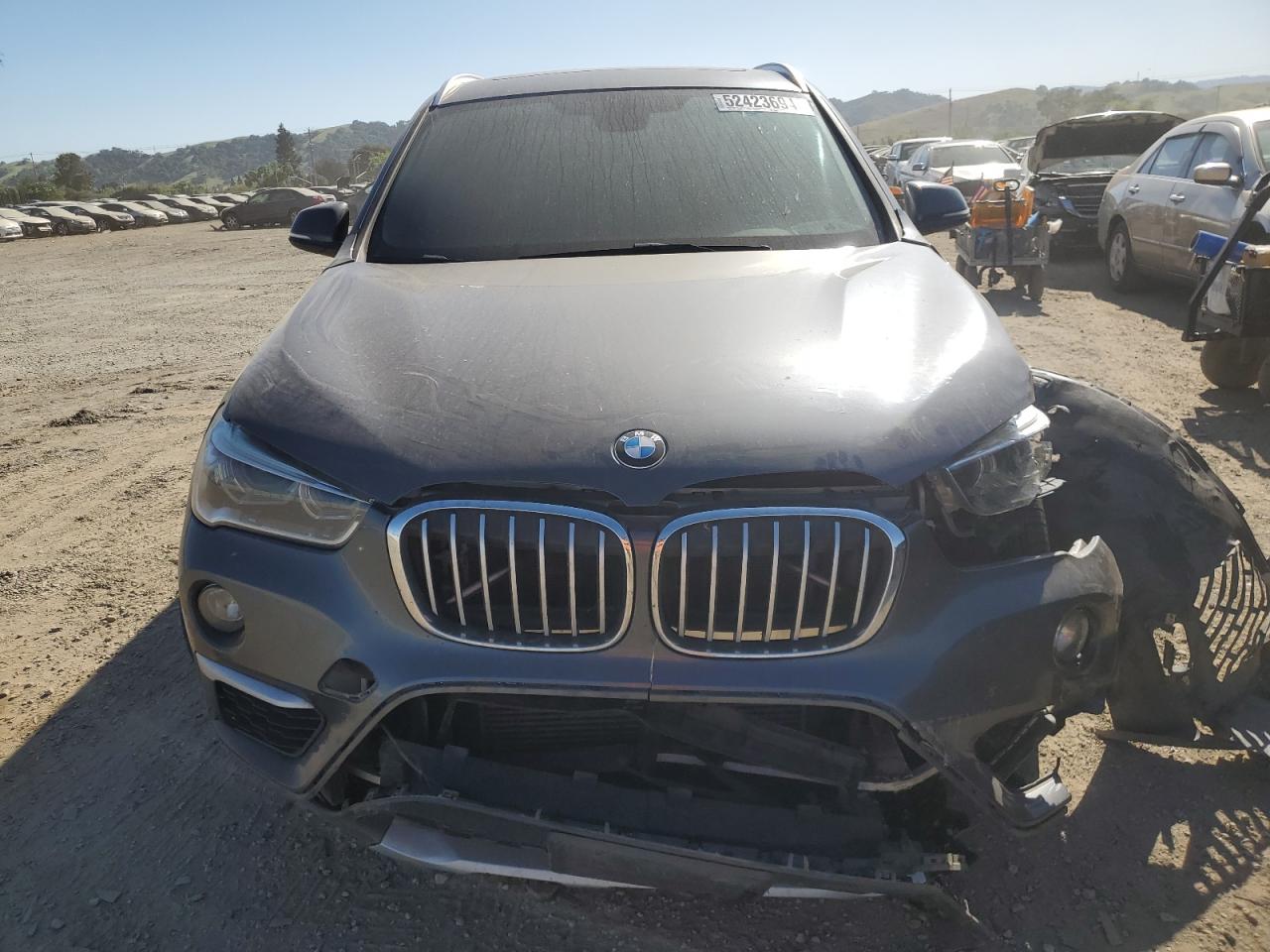 Photo 4 VIN: WBXHT3C37GP887456 - BMW X1 