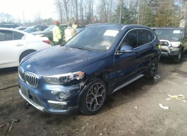 Photo 1 VIN: WBXHT3C37H5F67764 - BMW X1 