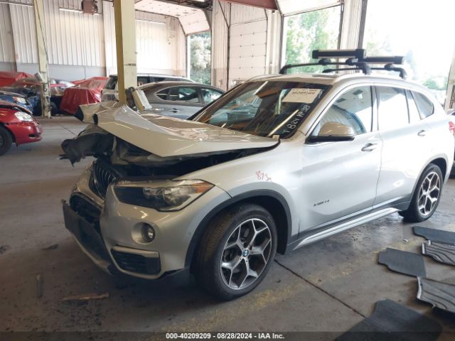 Photo 1 VIN: WBXHT3C37H5F70597 - BMW X1 