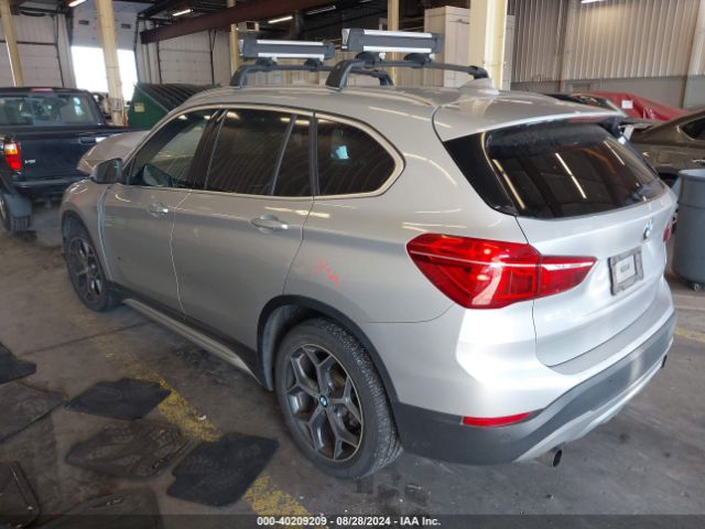 Photo 2 VIN: WBXHT3C37H5F70597 - BMW X1 