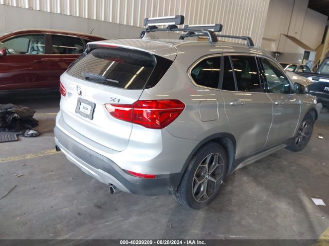 Photo 3 VIN: WBXHT3C37H5F70597 - BMW X1 