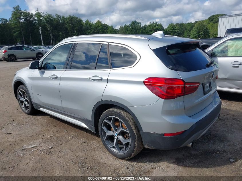 Photo 2 VIN: WBXHT3C37H5F72222 - BMW X1 