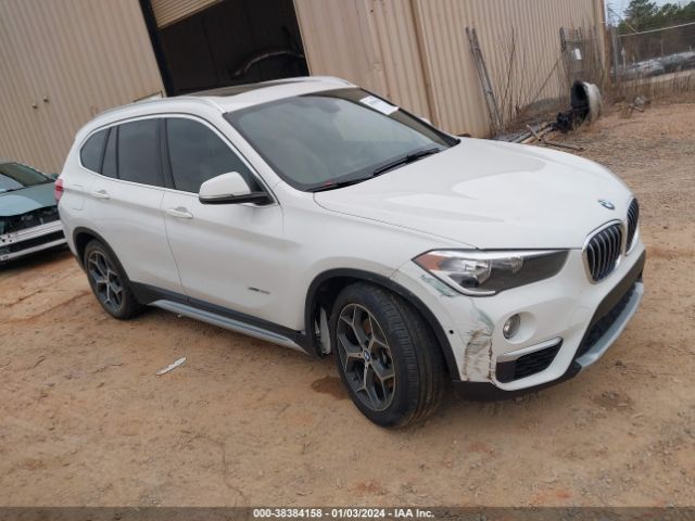 Photo 0 VIN: WBXHT3C37H5F75332 - BMW X1 